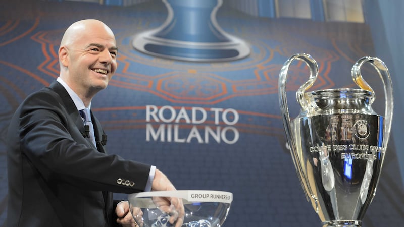 UEFA Secretary General and FIFA president candidate, Gianni Infantino, draws a ball next to the&nbsp;Champions&nbsp;League&nbsp;Trophy, during the draw of the 2015/16&nbsp;Champions&nbsp;League&nbsp;Round of 16 at the UEFA Headquarters in Nyonc.&nbsp;