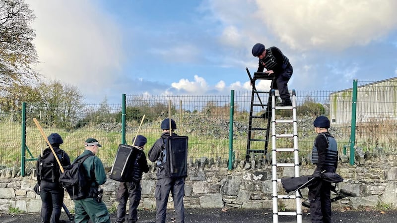 Army search teams assisted by the PSNI following the attempted murder of two officers in Strabane in November 22. Picture by David Young/PA. 