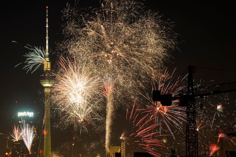 Fireworks explode around the Berlin TV Tower during New Year celebrations (Markus Schreiber/AP)