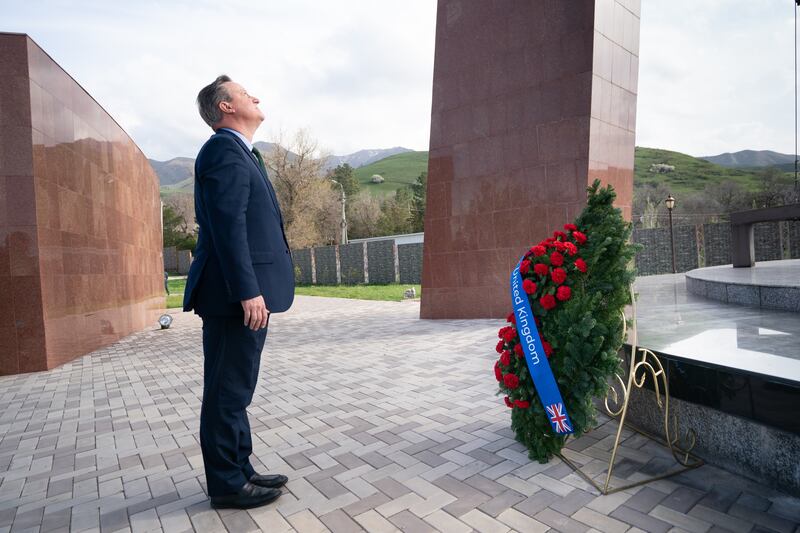 Foreign Secretary Lord David Cameron visits the Ata-Beyit memorial in Bishkek in Kyrgyzstan during his five-day tour of the Central Asia region