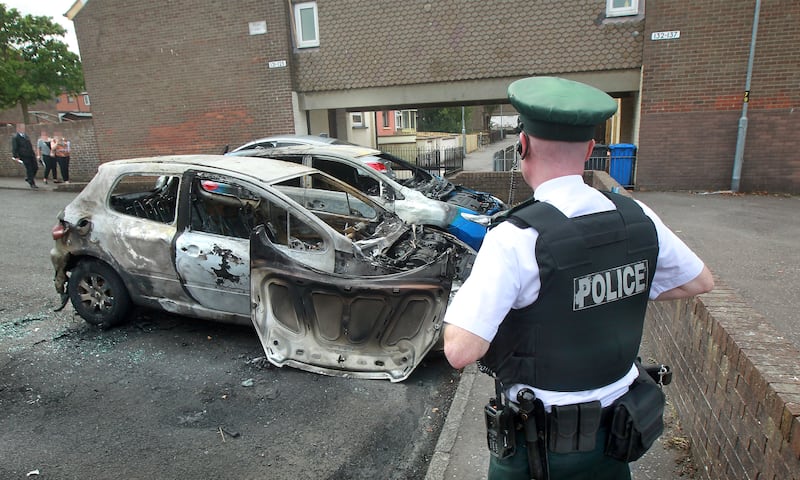 &nbsp;A burnt out car in the Lincoln Court area of Derry following a shooting on Tuesday morning. Picture by Margaret McLaughlin