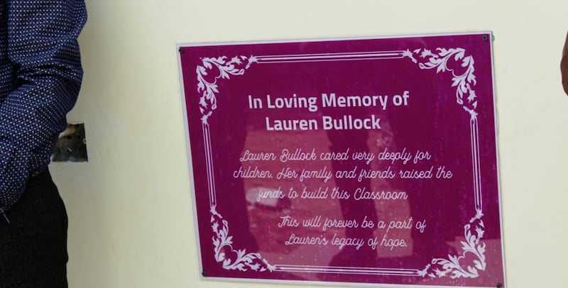 Purple was chosen for the plaque because it was Lauren&#39;s favourite colour.  