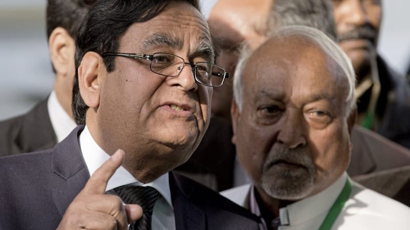 Lawyer Saiful Malook, left, speaks to reporters in Islamabad along with Pakistani Christian leader Joseph Francis after the supreme court&#39;s decision. Picture by BK Bangash/AP 