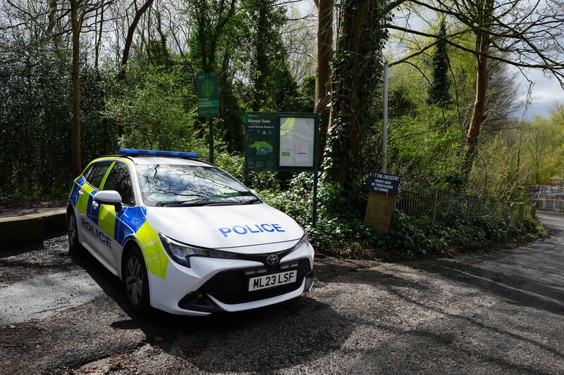 A police car at the entrance to Kersal Dale, near Salford