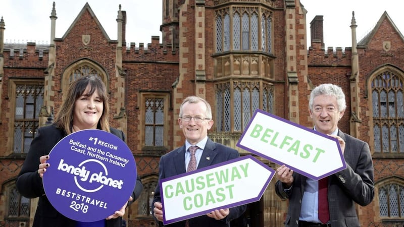 Belfast and the Causeway Coast were named the number one region in the world to visit in 2018 by Lonely Planet, coming ahead of places like Alaska, the Languedoc-Roussillon region in France and the Aeolian islands in Italy. N&oacute;ir&iacute;n Hegarty, Lonely Planet&rsquo;s operations director in Ireland, is pictured with Niall Gibbons, CEO of Tourism Ireland (centre) and John McGrillen, CEO of Tourism NI. Photo: Darren Kidd/PressEye 