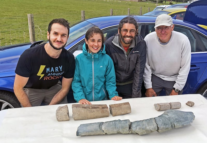 Dr Dean Lomax, Ruby Reynolds, Justin Reynolds and Paul de la Salle look at the fossils