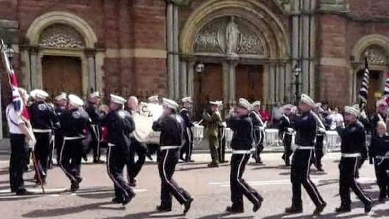 Loyalist bandsmen marching outside St Patrick&#39;s Church in July 2012 