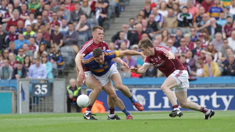 Galway's David Wynne and Liam Silke try to close down Tipperary's Philip Austin during last Sunday's All-Ireland Senior Football Championship quarter-final at Croke Park.&nbsp;Picture by Colm O'Reilly&nbsp;