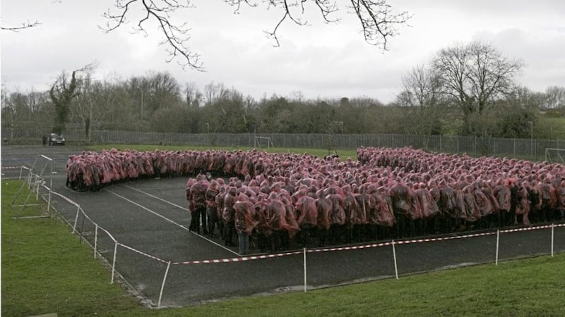 Pupils from Lismore Comprehensive school in Craigavon during their Guinness World Record to make the largest human Pi symbol. Picture by Hugh Russell 
