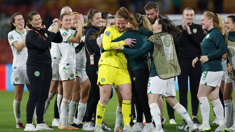 Republic of Ireland goalkeeper Courtney Brosnan is congratulated by her team-mates (PA).