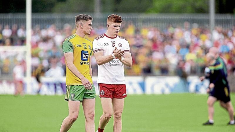 Donegal&#39;s Ciaran Thompson (left) up against Tyrone&#39;s Cathal McShane earlier this year. Picture by Seamus Loughran. 