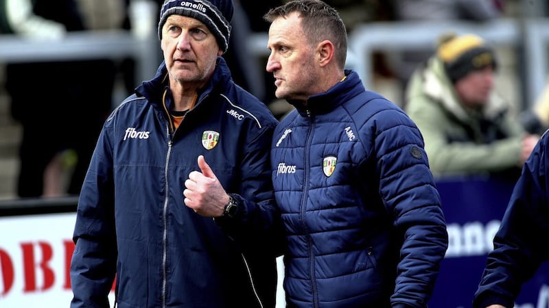 Antrim manager Andy McEntee and assistant John McCloskey deep in conversation Picture: Seamus Loughran. 