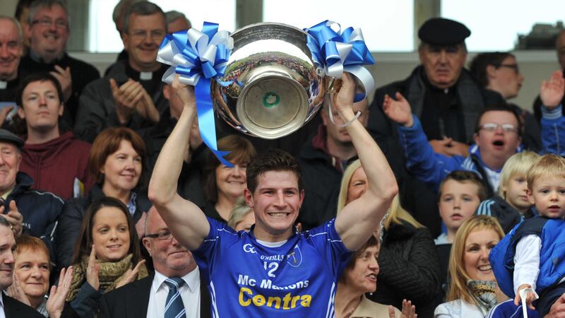 Darren Hughes lifts the Mick Duffy Cup after Scotstown&rsquo;s Monaghan SFC final win over Clontibret in 2013. After losing last year&rsquo;s decider to Clontibret, Scotstown are favourites to reclaim the title against a Monaghan Harps side seeking the club&rsquo;s first SFC win in 92 years