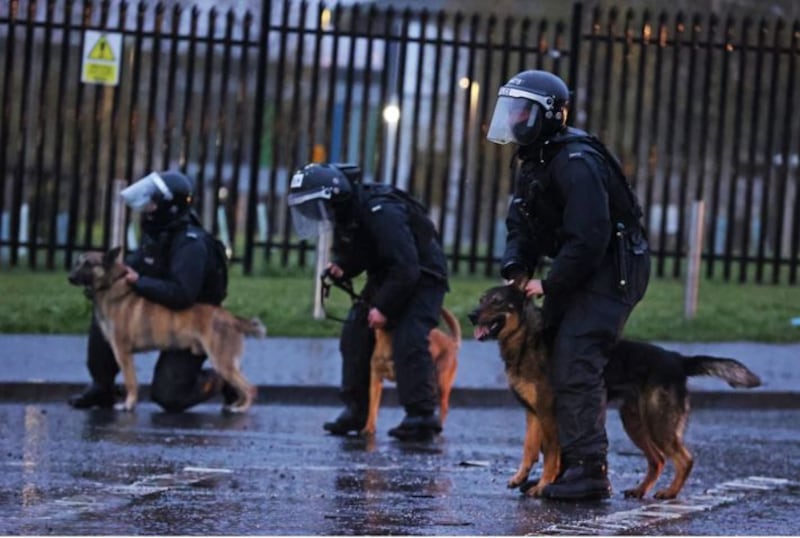 &nbsp;PSNI officers with dogs in Belfast during further unrest. Picture date: Thursday April 8, 2021.