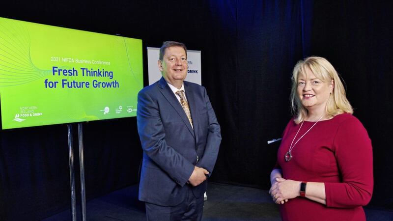 NIFDA executive director Michael Bell with Gillian Morris, head of corporate banking NI at HSBC UK. Picture: Brian Morrison 