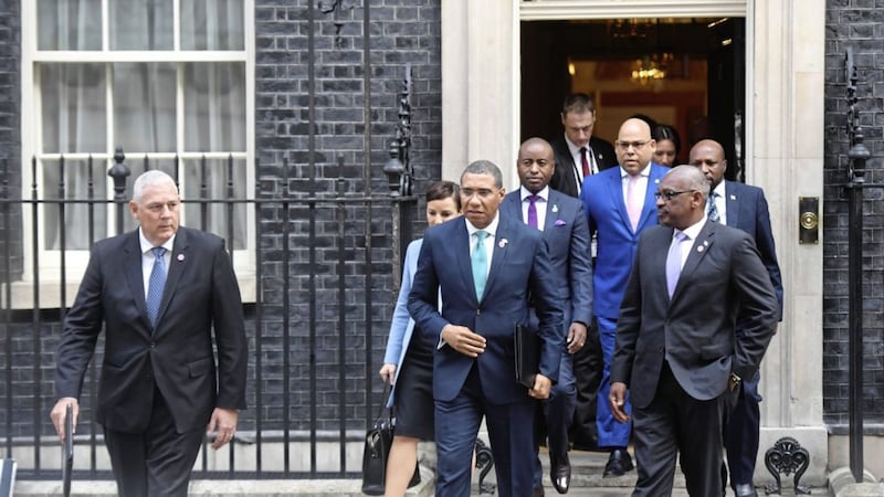 The prime minister of Jamaica Andrew Holness, with other members of the delgation, leaving 10 Downing Street after the meeting with Theresa May in relation to the Windrush generation immigration controversy. Picture by Victoria Jones, Press Association 