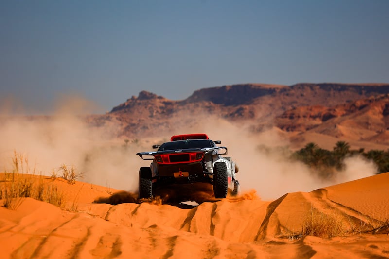 An Audi RS Q e-tron pictured in action on the desert sand