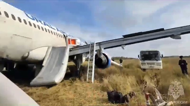 An Airbus A320 after an emergency landing near Ubinskoye village, Novosibirsk Region, Russia (Ministry of Emergency Situations press service via AP)