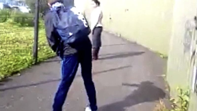 The online video showed youths harassing a Romanian woman, with one appearing to throw a stone at her 