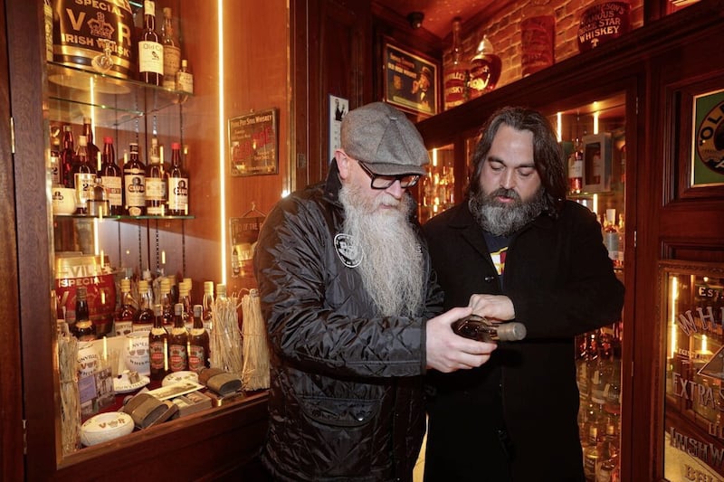 Conor Owens with Jim Ingram of The Friend at Hand Irish whiskey emporium and museum in Hill Street, Belfast. Picture by Mal McCann. 