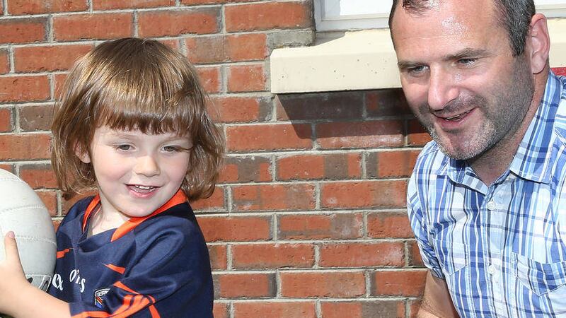 GAA All Star Steven McDonnell pictured at home with his 3 year old son Cahir.