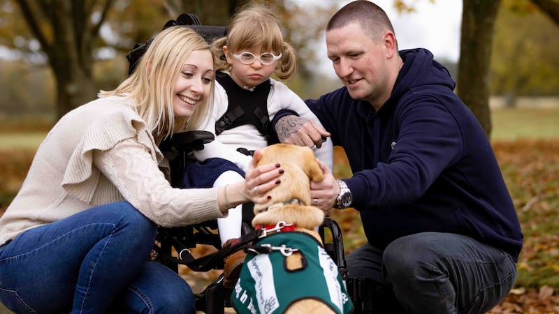 Adam and Amy Pryor said the golden Labrador has ‘brought a bit of magic’ into their lives while they and their daughter Charlotte have had to shield.