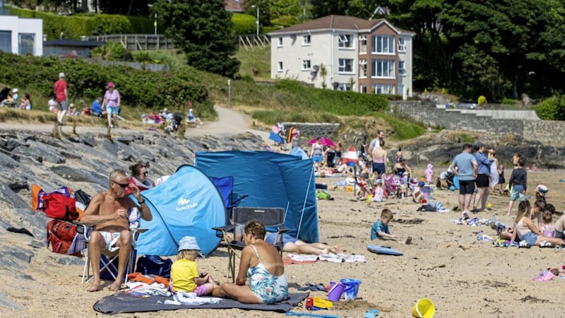 People enjoying the sun at Helen&#39;s Bay beach in Co Down. Picture by Liam McBurney/PA Wire 