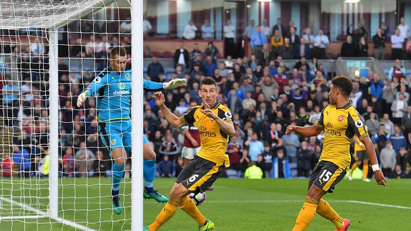<span style="font-size: 13.3333px; font-family: Arial, Verdana, sans-serif;">Arsenal's Laurent Koscielny scores the winner in Sunday's Premier League match against Burnley at Turf Moor<br />Picture by PA</span>