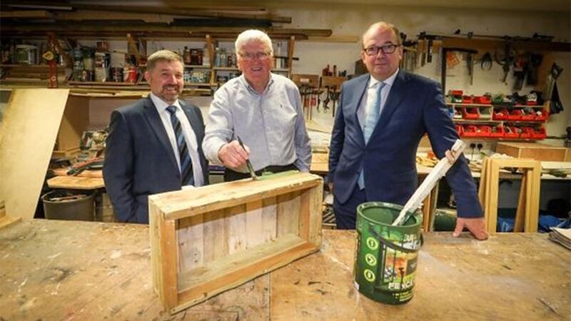 Health Minister Robin Swann (left), Chief Medical Officer Sir Michael McBride (right) and Joe McCusker, chairman of the North Belfast Men&rsquo;s shed&nbsp;