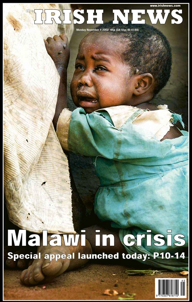 The 'Malawi in crisis' front page of the Irish News featuring a photograph by Hugh Russell
