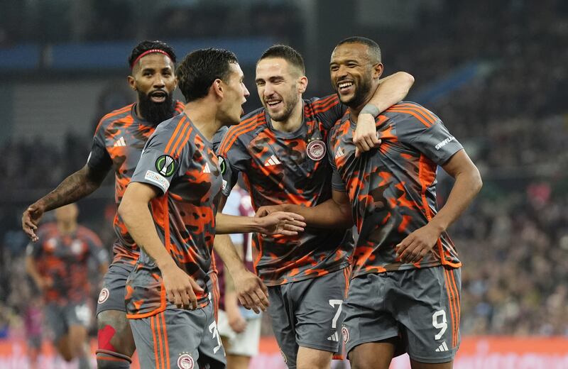 Ayoub El Kaabi (right) celebrates scoring his hat-trick goal
