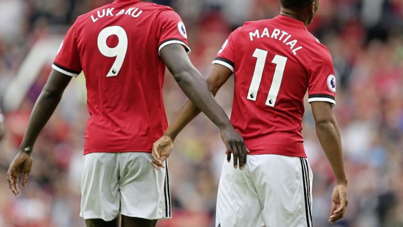 Anthony Martial and Romelu Lukaku were both on target as Manchester United began the season with a 4-0 win over West Ham 