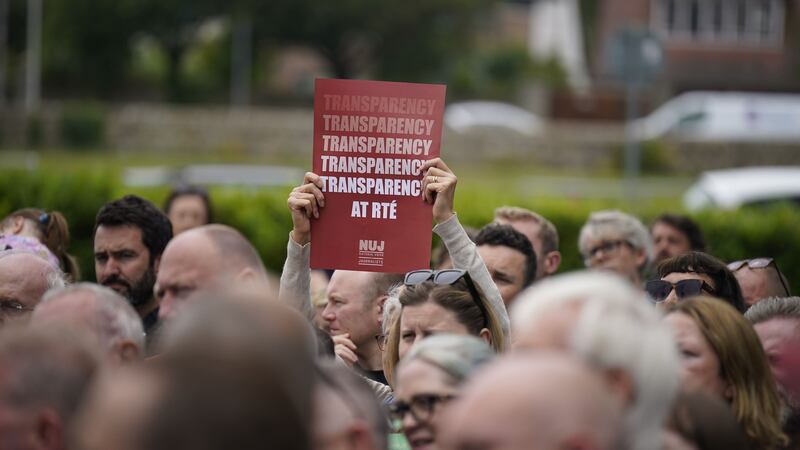 Members of staff at RTE take part in a protest at the broadcaster’s headquarters in Donnybrook, Dublin (PA)