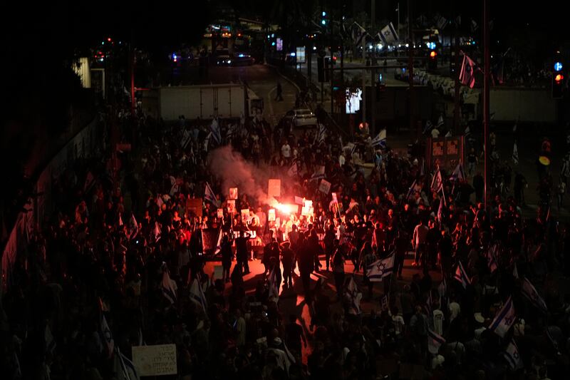 Fresh protests against Mr Netanyahu’s government took place in Tel Aviv (AP)