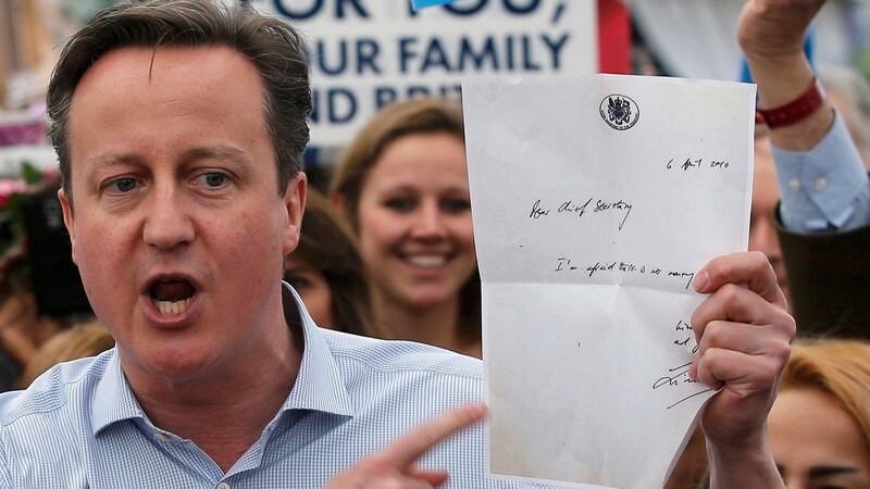 Former Prime Minister David Cameron points to the note left by outgoing Labour Treasury Minister Liam Byrne saying "There is no more money"
