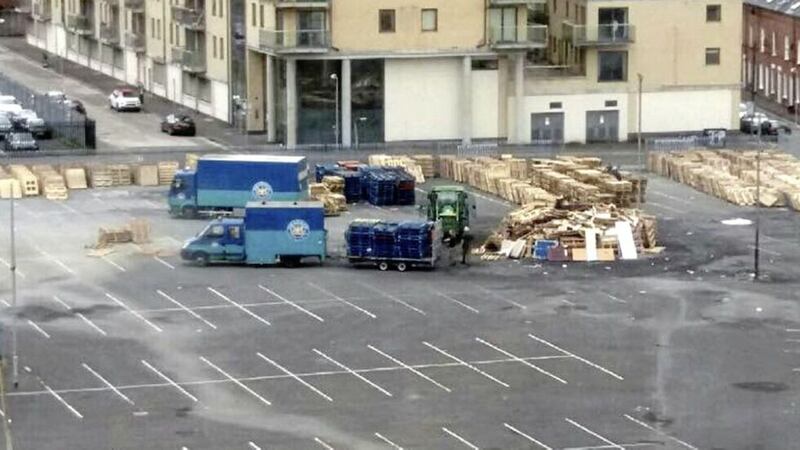 Belfast City Council vans removing pallets near the Holiday Inn in Belfast city centre 