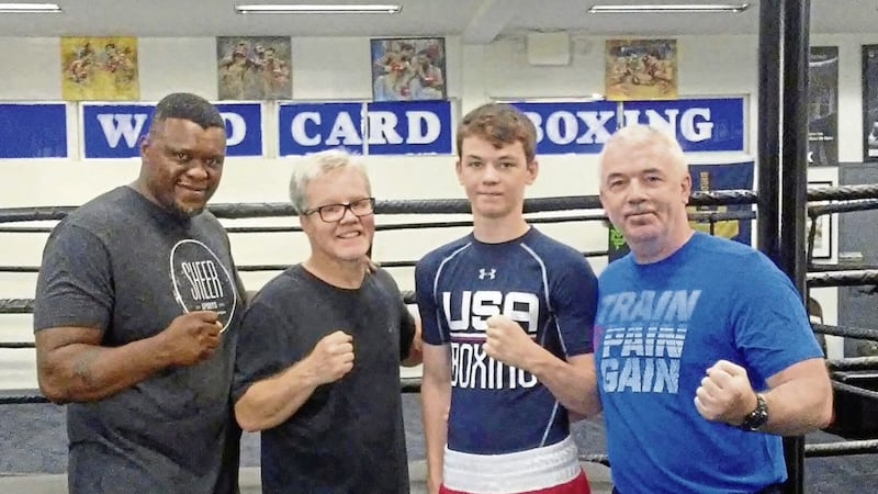 Aaron McKenna with dad Fergal (right), renowned trainer Freddie Roach and Courage Tshabalala before he travelled to Russia for the Nikolay Pavlyukov tournament 