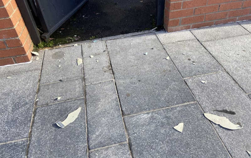Debris could be seen at the front entrance to Sinn F&eacute;in's Connolly House on the Andersonstown Road in Belfast this morning. Picture by Mal McCann&nbsp;