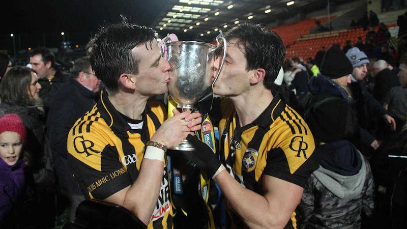 Crossmaglen's Paul Hughes and James Morgan with the Seamus McFerran Cup<br />Picture by Colm O'Reilly
