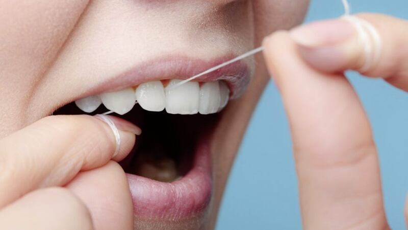 Using dental floss impregnated with the antiseptic chlorhexidine can help tackle bad breath. 