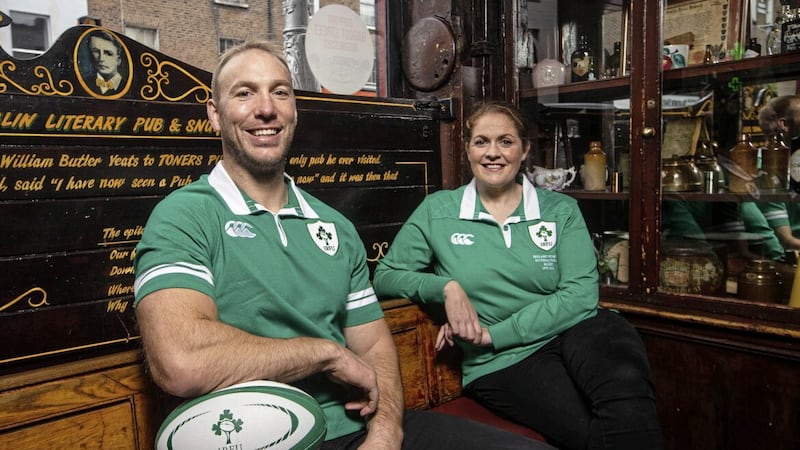 Former Ireland internationals Stephen Ferris and Fiona Coghlan in Toner's Pub, Dublin, wearing the new Canterbury Ireland Rugby Heritage jersey, inspired by the classic jerseys of the past. The Heritage jersey is available now via Intersport Elverys in store and via Elverys.ie, and on Canterbury.com 