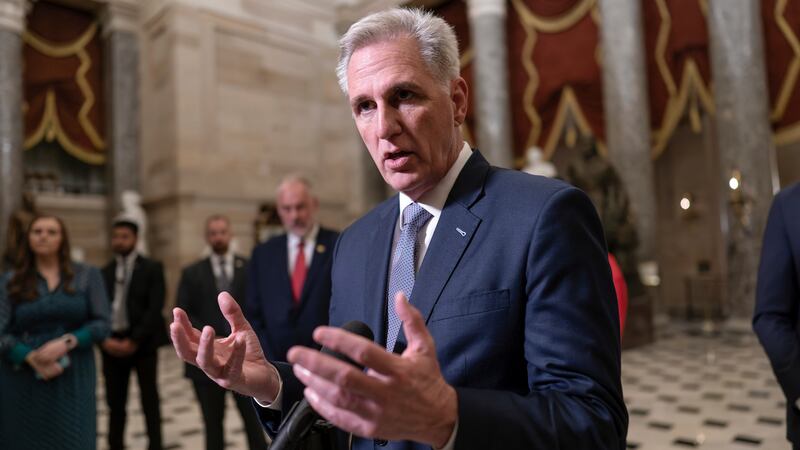 House Speaker Kevin McCarthy talks to reporters after voting to advance appropriations bills on the House floor (J Scott Applewhite/AP)