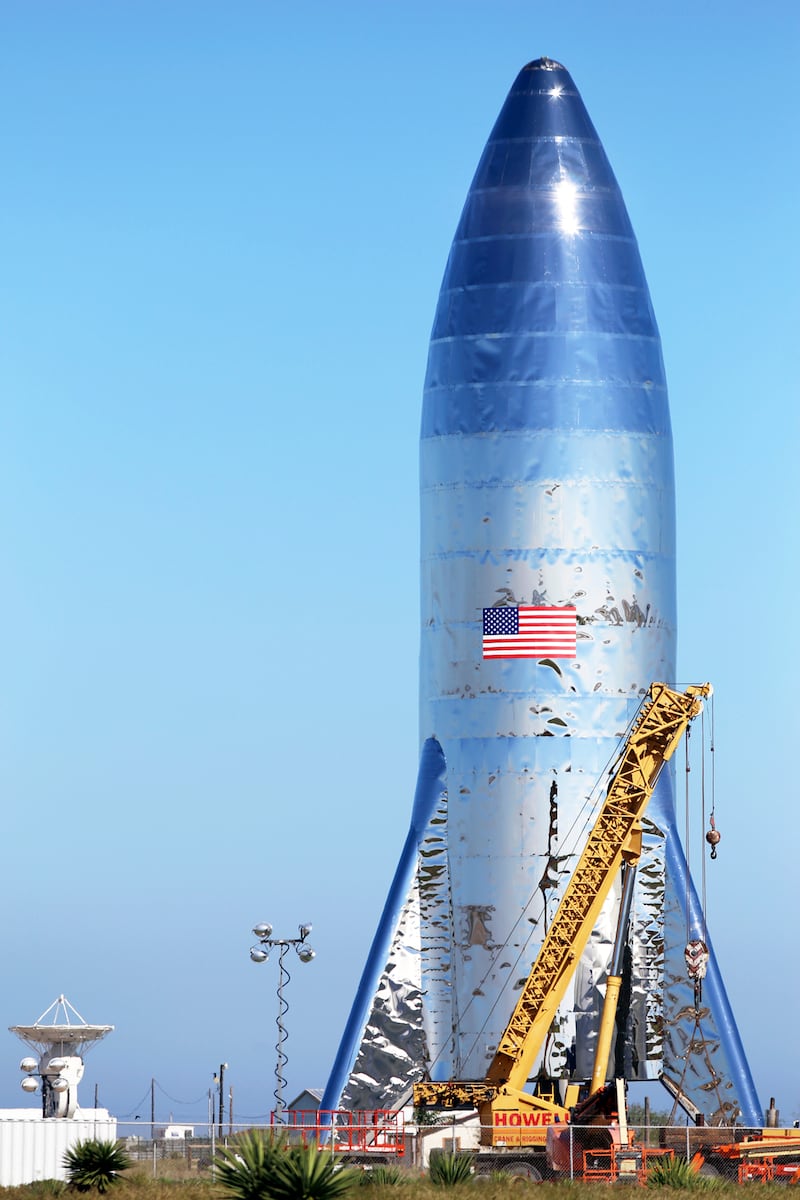 The SpaceX prototype Starship hopper stands at the Boca Chica Beach site in Texas