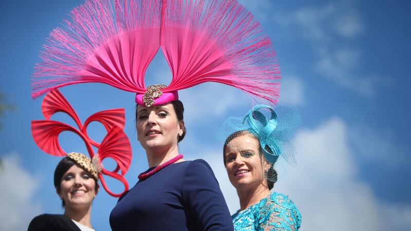 Milliner Caithriona King (centre) from Curafin displays some of her creations with Suzanne Burke (left) from Athlone and Cathy Dillon from Athenry during ladies' day. Picture by Brian Lawless, PA Wire
