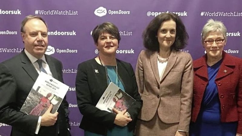 (L-R) Nigel Dodds, Arlene Foster, Theresa Villiers and Open Doors chief executive Henrietta Blyth at Westminster. Picture posted by Mrs Foster on twitter 