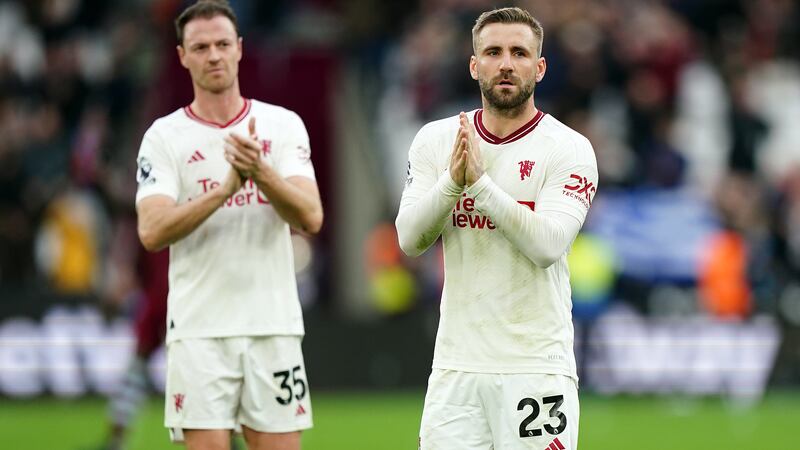Luke Shaw applauds the fans after the defeat at West Ham