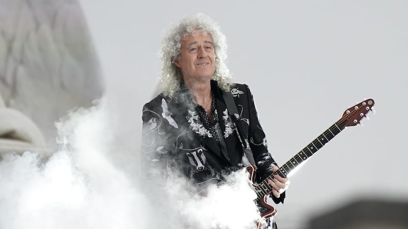 Queen’s guitarist said he did not personally persuade Her Majesty but had the idea along with the BBC to get her involved.