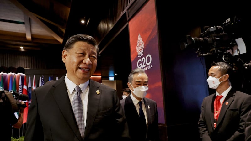 China's President Xi Jinping walks as he attends a session at the G20 Leaders' Summit, in Nusa Dua, Bali, Indonesia, Wednesday Nov. 16, 2022. (Willy Kurniawan/Pool Photo via AP)