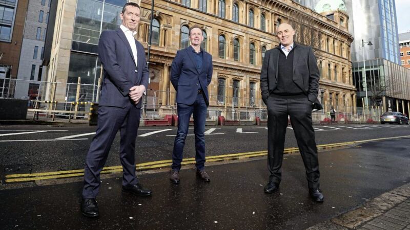 Outside Deloitte&rsquo;s new offices in Belfast are (from left) Martin Goss, director of Etain, Danny McConnell, lead consulting partner for Deloitte in Northern Ireland, and Peter Shields, director of Etain. Picture: Kelvin Boyes/PressEye 