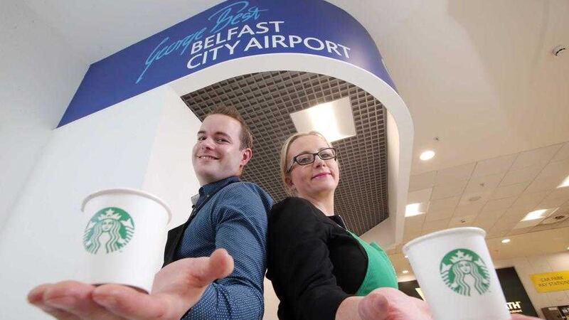 Announcing the Starbucks arrival are Joanne Deighan, commercial manager at Belfast City Airport, and Alex Woodhouse, hospitality manager at HMSHost 